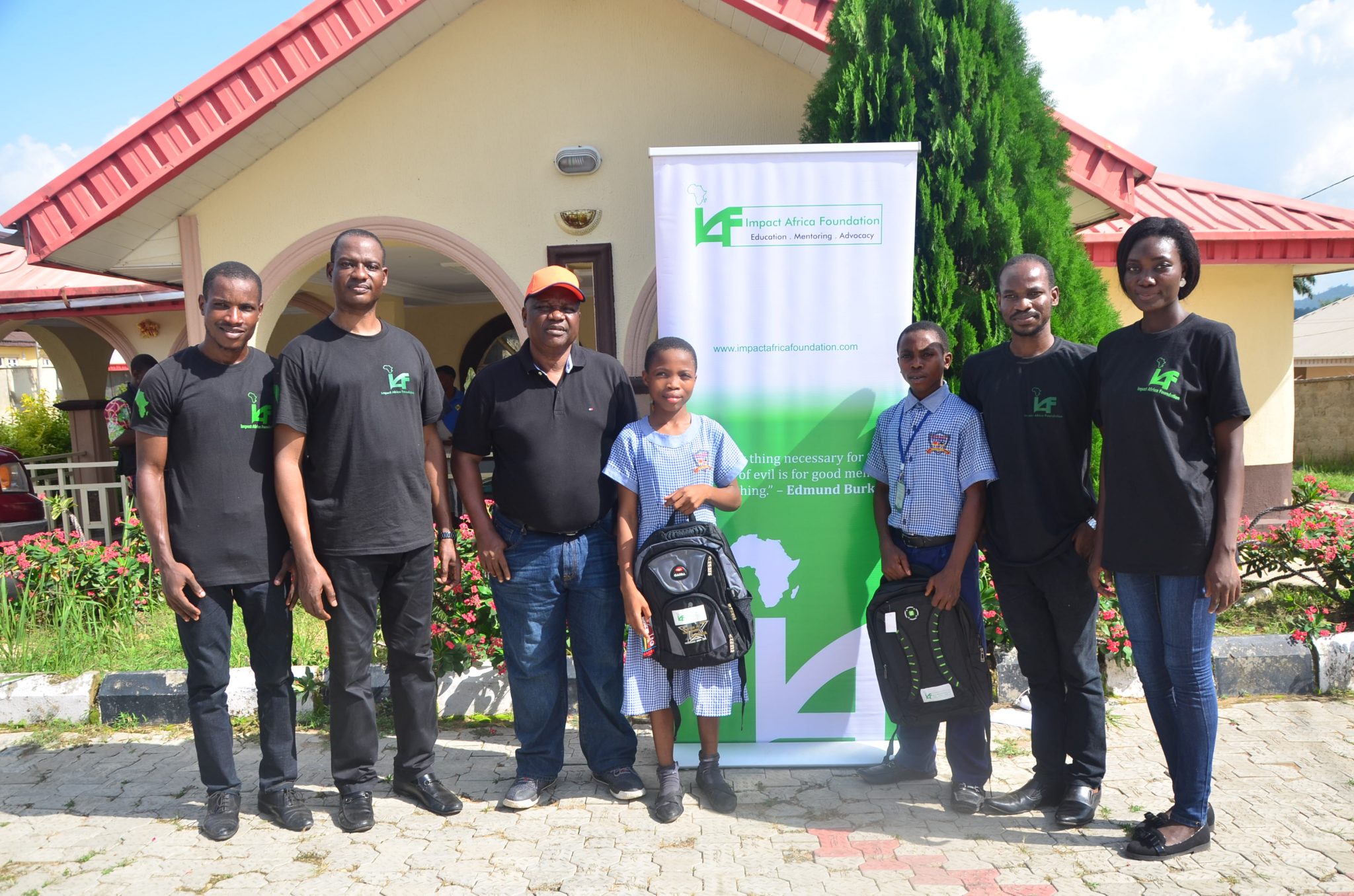 Oba Abolarin with the full student body and IAF partner team at Abolarin College